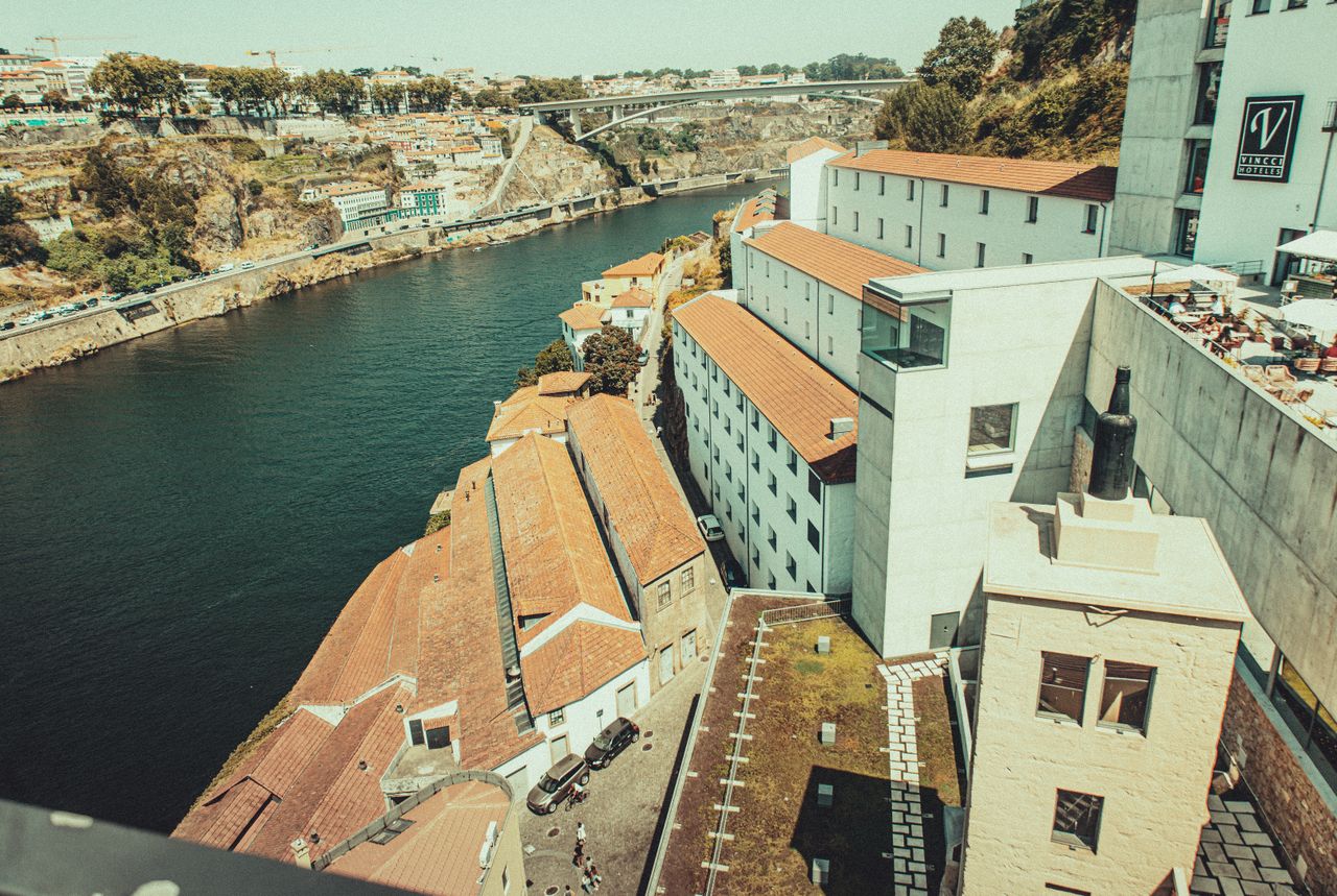 Explore the rooftops and scenic river views of Porto, Portugal, showcasing its unique architectural charm.